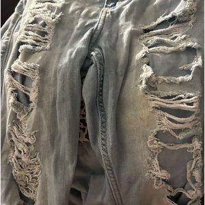 ripped light blue jeans